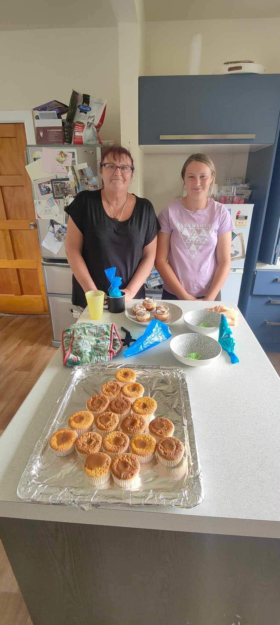 Getting ready to ice the cupcakes